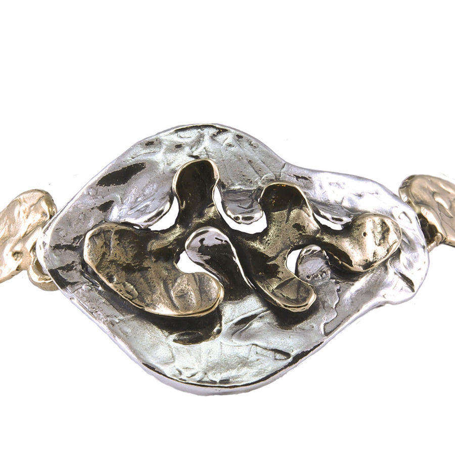 Bracciale semirigido Puzzle argento 925 e bronzo -  BA110