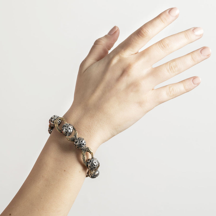 Bracciale snodato Galaxias sfere piccole argento 925 e bronzo - BA138